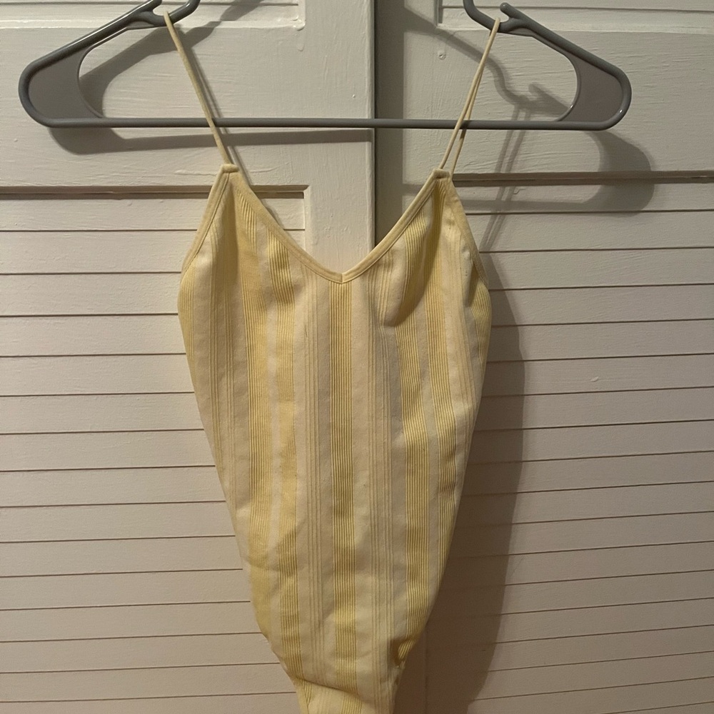 Colsie light yellow body suit